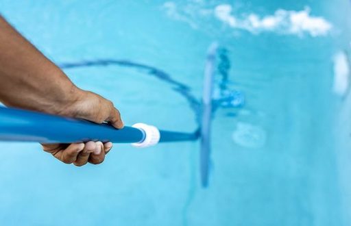 bigstock-people-cleaning-swimming-pool-469202053-7